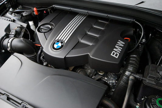 BMW N47 2000cc diesel engine, displaying its modern design and detailed components. The image highlights the engine's compact structure and advanced technology, emphasizing its performance and efficiency.