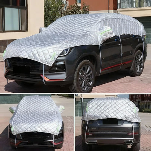 Car covered with a protective cover in an urban setting, featuring the Corning logo.