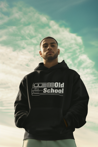 Man wearing a black hoodie with 'Old School' text against a scenic background