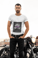 Man wearing a white t-shirt with a graphic design an text Life`s better in the fast lane standing next to a motorcycle. Bavarian old school